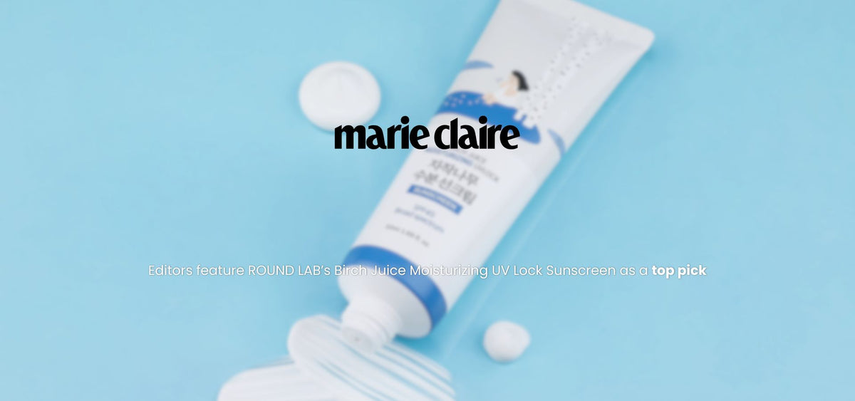 ROUND LAB Birch Juice UV Lock Sunscreen tube with cream swatches on blue, featured by Marie Claire as a top pick