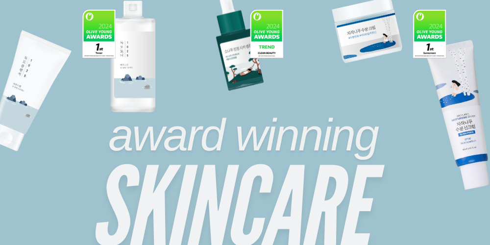 Award-winning Korean skincare products with Olive Young 2024 awards on a blue background.