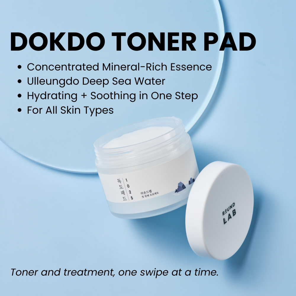 Angled view of 1025 Dokdo Toner Pad jar showcasing toner pads emerging from the open container on a blue background