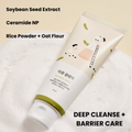 Angled view of Soybean Nourishing Cleanser tube on white fabric, labeled deep cleanser and barrier care