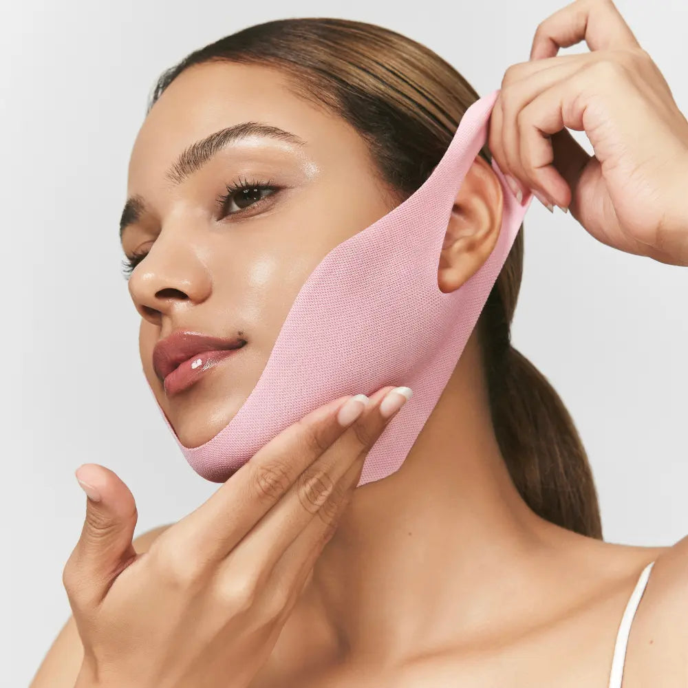 Pack of Camellia Deep Collagen V Lifting Gel Mask on a light pink background